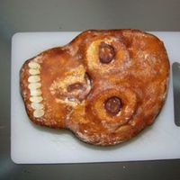 P1020783A.jpg That's 2d chocolate-coffee scull which I made for the grill party. The filling is chocolate-mascarpone, under fondant: all butter...