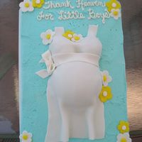 Baby Belly The cake is buttercream with fondant for the shirt.