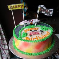 Speed Racer Cake I made this cake for brothers with close birthdays. The father gave me the car figurine and asked me to make a small cake.