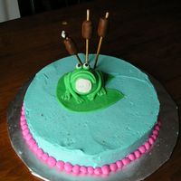 Kakesplus_229.jpg frog is made from fondant and so is lily pad.