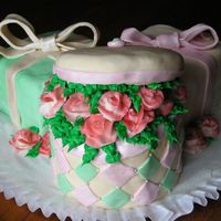 Bridal Shower Cake the cakes are covered in satin ice fondant with buttercream roses. i got this idea off of a cake i saw on here but i can't remember...