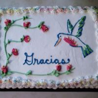 Humming Bird Cake Made the humming bird free hand from a picture I found on the net. I first drew with a tooth pick then came in with icing.