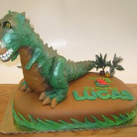 T-Rex Birthday T-Rexs is made from rice crispy treats with a fondant overlay. Everthing but the trees is completely edibile.