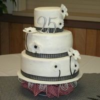 25Th Wedding Anniversary Thanks to Shorty56 for the inspiration on this one. Her cake was beautiful! I chose to use all buttercream with fondant accents. A really...