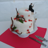 Hooked On Love 09/04/2010 Hooked on Love was the wedding theme. The cake was a moist chocolate cake with chocolate buttercream. Covered with fondant. The...