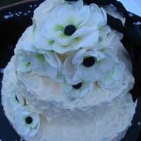 07/24/2010 Gumpaste Anemone. Devils food cake with raspberry white chocolate ganache and white chocolate cream cheese frosting. Delish.