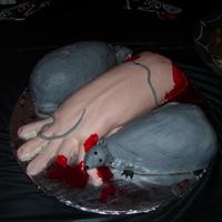Finger Lickn' Good Done for a Halloween Party! Arm and Rats are both Cake. Blood is just red color mixed with corn syrup. TFL!