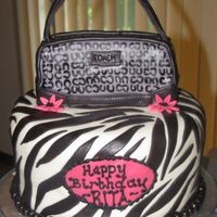 Coach-Zebra This was a fun one to do. They were receiving a coach purse as a gift (lucky-lucky). TFL.