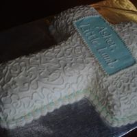 Baby's Baptism Cake This is modeled after Lisa's Easter cross cake. I used buttercream for the whole thing. Thanks to everyone on your expert adivce on...