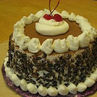 Img_2111.jpg Black Forest cake- Moist chocolate cake soaked in cherry juice, layered with fresh cream and cherries and finished off with more fresh...