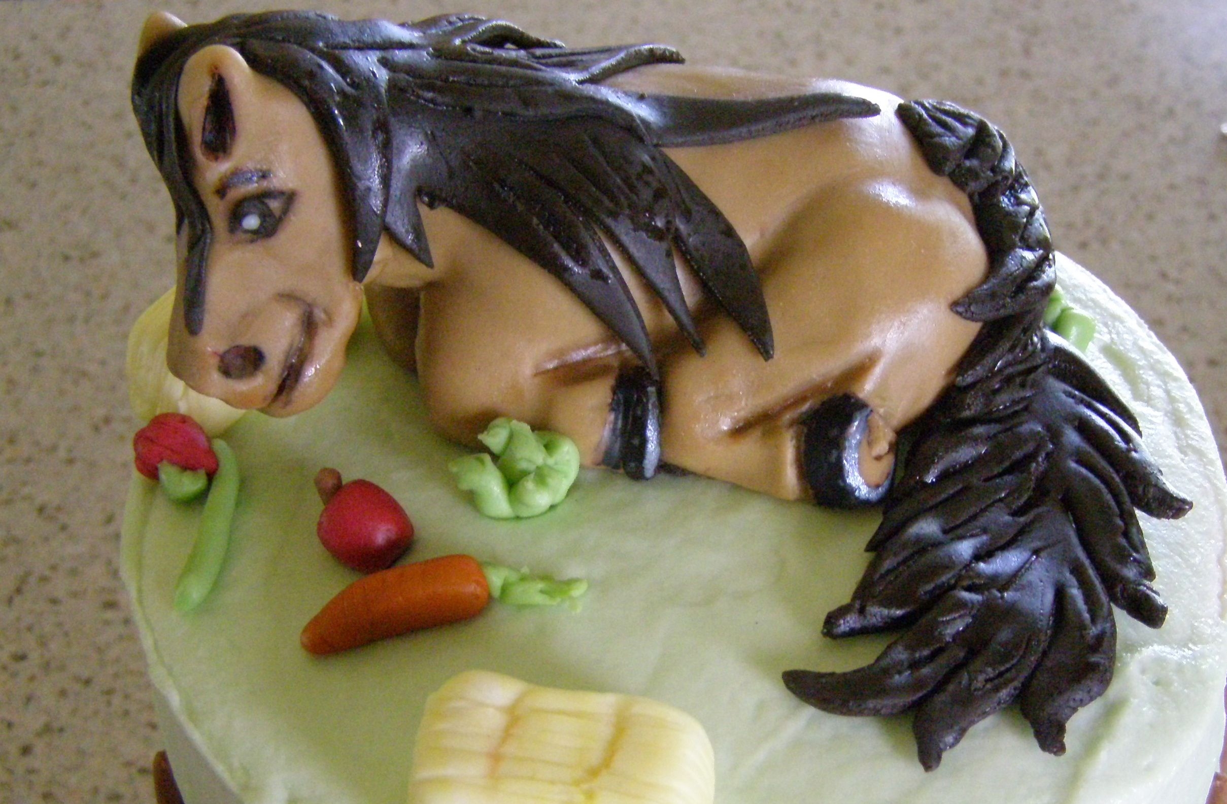 Horse Cake buttercream wasc with raspberry filling, fondant accents, cake was a request from my 9 yr old daughter she had even sketched out the cake...