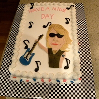 Bonjovi indebyi buttercream and fondant decorations, all the party decorations are pink and blue guitars and music notes, they wanted a bonjovi...