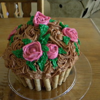 Giant Cupcake Frosted with buttercream. I borrowed someone's idea to use the cookies on the bottom. Sorry--can't remember who to give credit to...