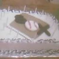 Fiance's 20 B-Day Cake yellow cake covered in buttercrean with fondant accents