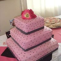 Pink And Black Bridal Shower This was a strawberry cake with all buttercream and ribbon border. The theme of the bridal shower was pink and black.
