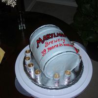 Birthday Keg White cake with buttercream icing decoration.