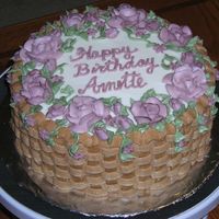 Basket With Flowers Oatmeal cake with buttercream icing.
