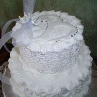 White Wedding Cake, Well Kinda... This is a cake I made for My 11 year old niece for her birthday. She wanted a "Frilly white wedding cake." I've never done a...