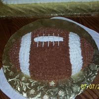 Football Cake This is the football cake that went along with the football field cake I made. It is milk chocolate cake with "granny's"...