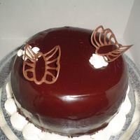 Cannoli Cake This was orderd for mothers day by a costumer. Used my bake and fill pan. Ganach icing.