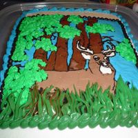 Deer made this for a friend who wanted a cake for her boyfriend. He is really into hunting so this is what I came up with. The whole scene is a...