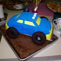 Dune Buggy I was trying to make a monster truck, but it turned out more like a NASCAR with huge wheels. Tasted very yummy though! :)