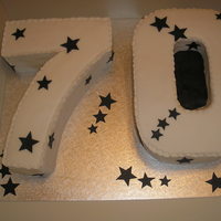 70Th Birthday Cake sponge birthday cake covered in sugarpaste.All cut out by free hand.