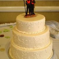 Wade Wedding I'm getting better! I was so pleased with this cake because I didn't have to roll and re-roll the fondant 5 times to get it...