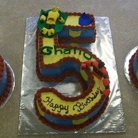 Transformer vanllia, chocolate, and orange with WCBC and fondant figures, liquid chocolate transfer for the masks.