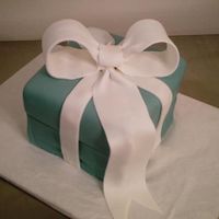 B3Lb.jpg Tiffany box competition cake; my 2nd time touching fondant! Seriously!!! No joke!