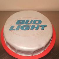 Beer Bottle Cap Cake Pound cake, b/c icing, Satin Ice fondant decorations.Huge cap isn't it?! Ha ha!