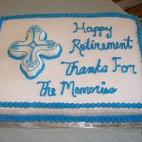 Blue Cross this was for a retirement party for our pastor, all buttercream except cross is fondant