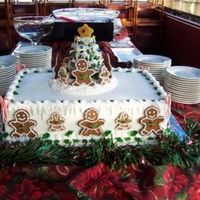 Gingerbread People And Tree 18x24 double layer yellow cake, buttercream frosting. Gingerbread cookie people decorated with royal. The tree is gingerbread cookies with...