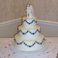 Shades Of Purple Flowers All Buttercream, different shades of royal icing flowers.