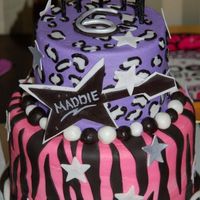 Rock-N-Roll Diva! Two-tiered cake (carrot and red velvet) to match the plates, etc. for my daughter's 6th birthday - totally rock-n-roll theme....