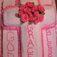 First Communion Cake Cross cake on a 1/2 sheet cake. Buttercream icing and fondant roses.