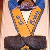 Hockey Sticks Make from one sheet cake. All buttercream with edible image logo.