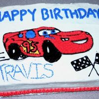 Lightning Mcqueen bc icing. piping gel to create outline and filled in with bc