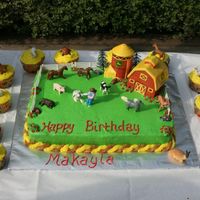 Farm Birthday Tried to use the "House cake pan" and it wouldn't stay on the edge of cake...so my best friend brought over more decor for...