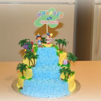 Dora The Explorer First attempt at tiered cake and it was one of my easiest. Had a lot of fun with this cake and my daughter loved the waterfall.