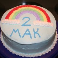 Rainbow My first cake to ever decorate... I'm taking Wilton Course I and LOVE IT!! Great stress reliver for me.