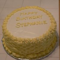 Birthday Cake To get some practice in I made a cake for someone's birthday at work. It's vanilla with cookies and cream filling with BC icing....