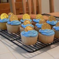 Pirate Theme Cupcakes I had left over batter from my last pirate cake I did and made cupcakes and put a chocolate covered gold coin on top. I did it kind of last...