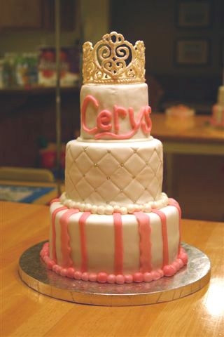 Cerys' 1St Birthday Vanilla cake (8, 6, 4) with cookies & cream filling. Covered in fondant with a piped white chocolate tiara.