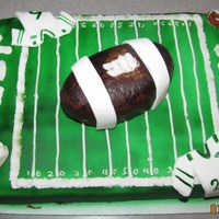 Jets Jets cake for playoff game:) Simple 1/4 sheet chocolate with choc buttercreme and MMF. Football is rice crispies covered in MMF. All other...