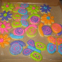 Butterflies, Flowers, Snails All done with buttercream icing--the customer loves bright colors.