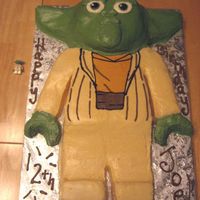 Yoda Lego Figurine My son wanted an exact replica of a Yoda Lego figurine. I am not a fan of sculpting cake, but I made an exception for him.