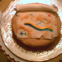Treasure Map Mini Cake I was inspired by a cake in the Debbie Brown book.I didn't have any chocolate coins but i think it still looks good.