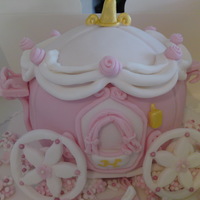Princess Carriage Disney princess carriage for my daughters 4th birthday, put a photo of her head in the window after i took the photo. Is fondent covered...