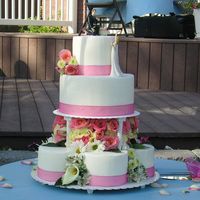 Melanies_Cake.jpg My sister-in-law gave me three pictures of wedding cakes she liked and I combined parts if each and this is what I came up with. It is all...